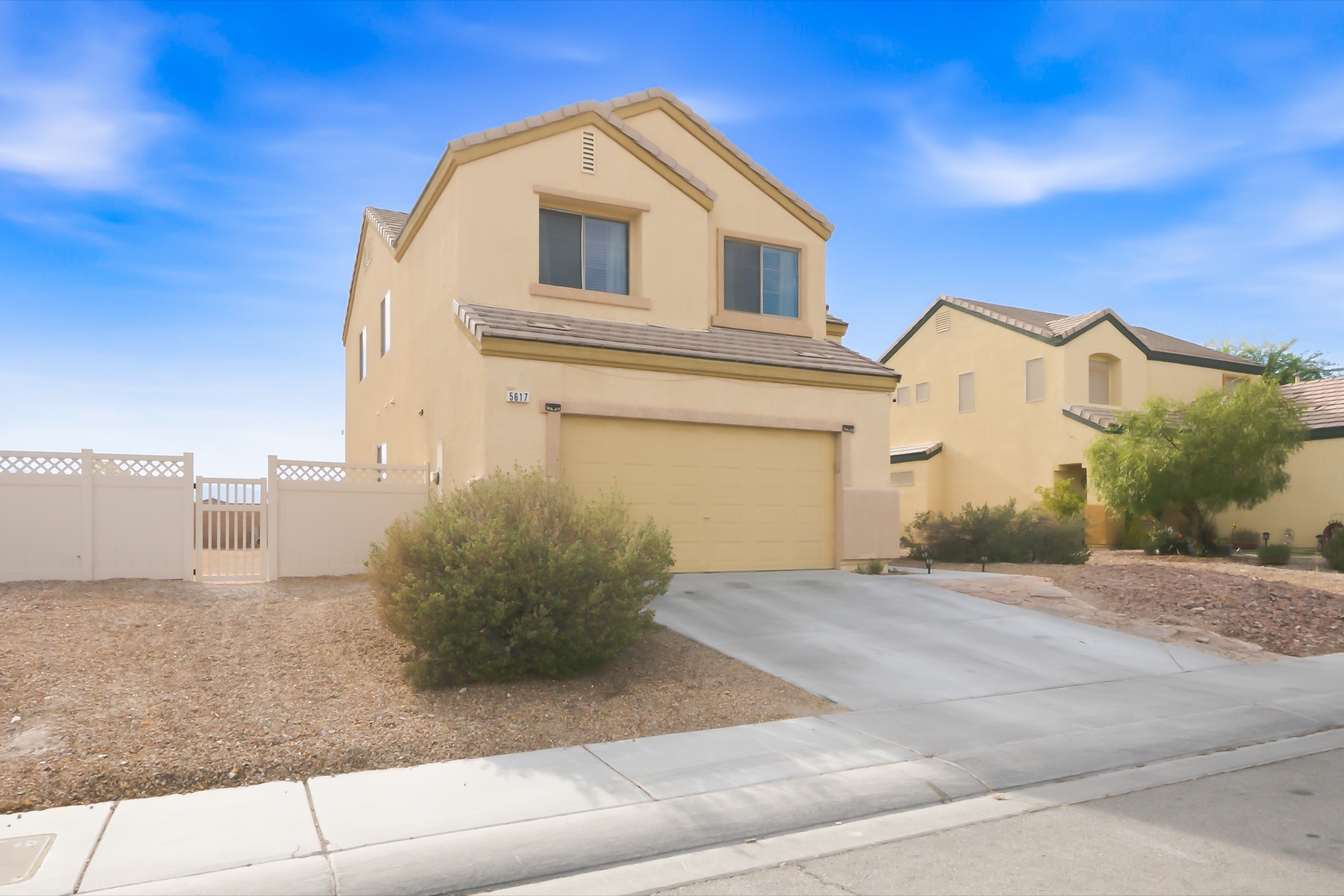 Daytime front exterior of 5617 Midnight Breeze Street