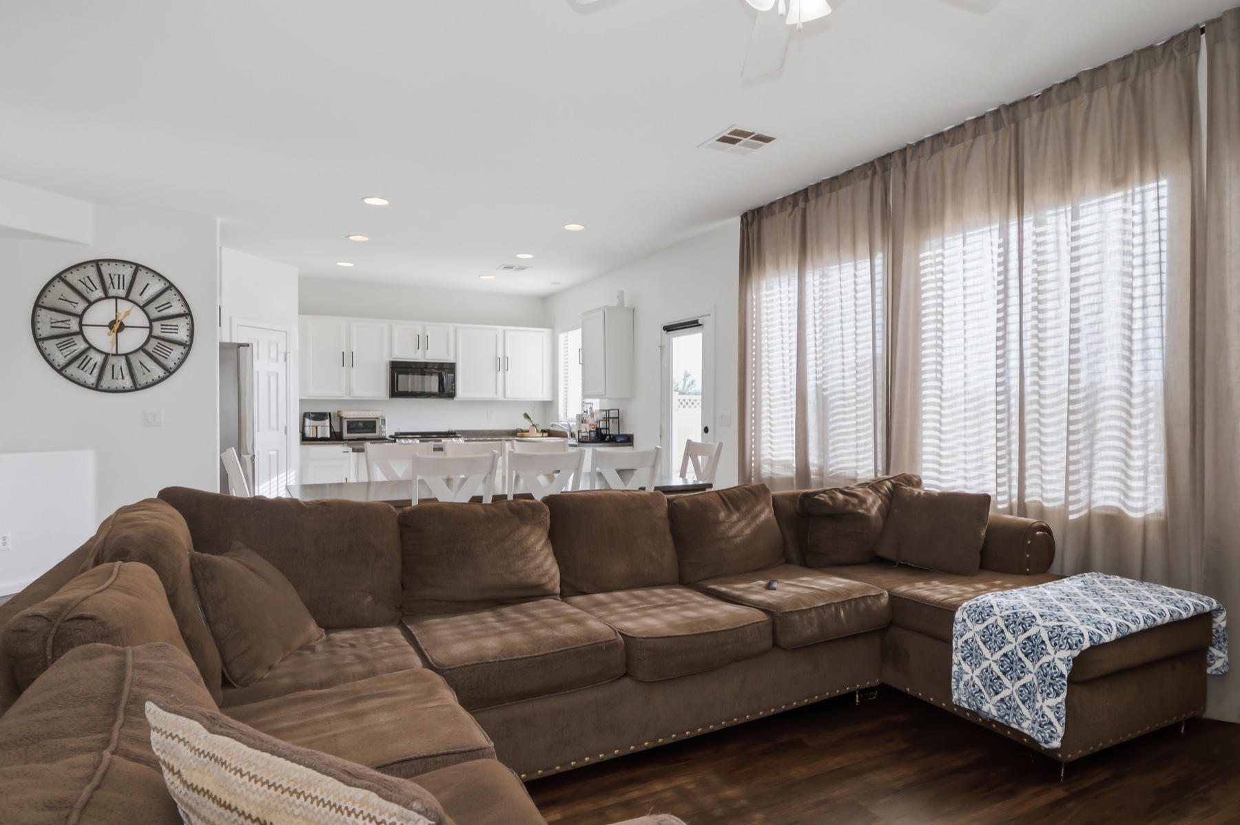 Open living room with kitchen beyond